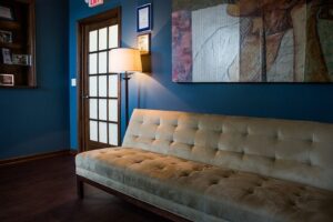 Indoor view of reception area couch | robert frank md
